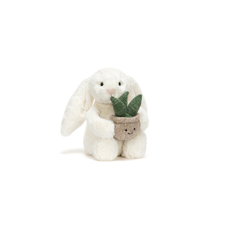 Lapin crème avec une plante 31cm