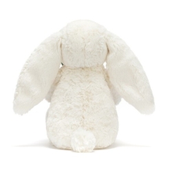 Lapin crème avec une plante 31cm