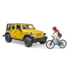 Jeep Wrangler Rubicon jaune avec cycliste