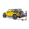 Jeep Wrangler Rubicon jaune avec cycliste
